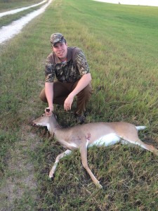 Jason Schenk, the oldest, with his deer.